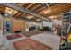 Spacious basement with concrete floors, wooden beams, and ample storage space for a variety of needs at 9722 N Gasburg Rd, Mooresville, IN 46158