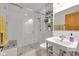 Modern bathroom with glass enclosed shower, white subway tile, and pedestal sink at 9722 N Gasburg Rd, Mooresville, IN 46158