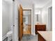 Bathroom with a view of a bedroom, featuring a vanity with modern fixtures and tiled flooring at 9722 N Gasburg Rd, Mooresville, IN 46158