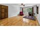 Bedroom features hardwood floors, natural lighting, and neutral walls, creating a cozy and inviting atmosphere at 9722 N Gasburg Rd, Mooresville, IN 46158
