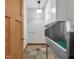 Functional mud room featuring a utility sink, storage cabinets, and durable tile flooring for easy maintenance at 9722 N Gasburg Rd, Mooresville, IN 46158