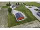 Sprawling property with well-maintained lawn, modern barn, and farmhouse at 10769 Shelbyville Rd, Indianapolis, IN 46259