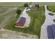 Expansive property featuring a modern barn, farmhouse, and lush green lawn at 10769 Shelbyville Rd, Indianapolis, IN 46259