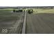 Scenic aerial view of farmland with a road cutting through at 10769 Shelbyville Rd, Indianapolis, IN 46259