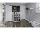 Cozy bedroom with hardwood floors, neutral walls, and ample closet space, perfect for a restful retreat at 10769 Shelbyville Rd, Indianapolis, IN 46259