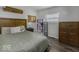 Bedroom with a queen-size bed, and wood-look flooring, creating a cozy and inviting space at 10769 Shelbyville Rd, Indianapolis, IN 46259