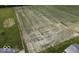 An aerial view captures an expansive field at 10769 Shelbyville Rd, Indianapolis, IN 46259