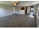 Spacious living room with modern flooring and ample natural light, creating a comfortable and inviting atmosphere at 10891 Sweetsen Rd, Camby, IN 46113