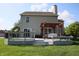 Spacious backyard with a deck, pergola, and green lawn, perfect for outdoor enjoyment at 10949 Haig Point Dr, Fishers, IN 46037