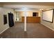 Finished basement featuring a bar area and a large entertainment space at 10949 Haig Point Dr, Fishers, IN 46037