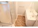 Bright bathroom featuring double sinks, a shower, and a window at 10949 Haig Point Dr, Fishers, IN 46037