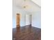 Spacious bedroom with vaulted ceiling, ceiling fan, and ensuite bathroom access at 10949 Haig Point Dr, Fishers, IN 46037