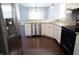 Bright kitchen with granite countertops, stainless steel appliances, and a convenient breakfast bar area at 10949 Haig Point Dr, Fishers, IN 46037