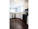 Well-lit kitchen featuring white cabinets, granite countertops, and stainless steel appliances at 10949 Haig Point Dr, Fishers, IN 46037