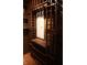Wine cellar's custom shelving provides ample wine storage capacity at 10949 Haig Point Dr, Fishers, IN 46037