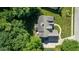 Aerial view of the house and property with large, shady trees at 11350 Old Stone Dr, Indianapolis, IN 46236