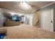 Spacious finished basement featuring neutral carpet, stairs to main floor, and room to entertain at 11350 Old Stone Dr, Indianapolis, IN 46236