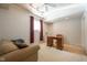 This home office has carpet, a desk, and a window at 11350 Old Stone Dr, Indianapolis, IN 46236