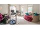 Bright living room featuring a chair, and windows with lots of natural light at 11350 Old Stone Dr, Indianapolis, IN 46236