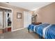 Comfortable bedroom with carpet, closet, mirror, and furnishings at 12113 N Rooker Rd, Mooresville, IN 46158