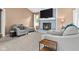 Cozy living room with fireplace and plush seating, perfect for relaxation at 12113 N Rooker Rd, Mooresville, IN 46158