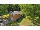Aerial view showcases a home with mature trees, and a well manicured lawn at 1302 N Furman Ave, Indianapolis, IN 46214