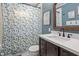 Bathroom featuring a shower, vanity, mirror, and stylish shower curtain at 1302 N Furman Ave, Indianapolis, IN 46214