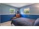 Bedroom with bed, and view of large window that provides plenty of natural light at 1302 N Furman Ave, Indianapolis, IN 46214