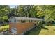 Charming home with a brick facade, well-maintained lawn, and inviting curb appeal at 1302 N Furman Ave, Indianapolis, IN 46214