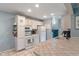 Kitchen features a gas range, lots of cabinets and a laundry room at 1302 N Furman Ave, Indianapolis, IN 46214