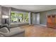 Inviting living room with lots of natural light and wood floors at 1302 N Furman Ave, Indianapolis, IN 46214