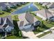 Stunning aerial view of a home near a pond with a fountain in a well-maintained community at 16235 Natures Way, Westfield, IN 46074