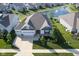Beautiful aerial shot showcasing the home's landscaping and proximity to the community pond at 16235 Natures Way, Westfield, IN 46074