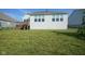 Well-maintained lawn with wooden deck is perfect for outdoor entertainment at 16235 Natures Way, Westfield, IN 46074