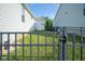 View of the backyard, enclosed by a metal fence at 16235 Natures Way, Westfield, IN 46074