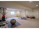 Basement with exercise equipment, a play area and access to stairs at 16235 Natures Way, Westfield, IN 46074