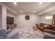 Finished basement featuring a comfortable seating area, entertainment setup, and stylish design elements at 16235 Natures Way, Westfield, IN 46074