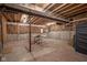 Unfinished basement with exposed beams, concrete walls, and concrete floor, ready for customization and storage at 16235 Natures Way, Westfield, IN 46074