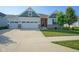 Attractive home with a well-manicured lawn, two-car garage, and appealing architectural accents at 16235 Natures Way, Westfield, IN 46074