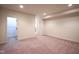 Spacious room with neutral carpet, ample lighting, and multiple entryways, perfect for flexible use at 16235 Natures Way, Westfield, IN 46074