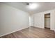 A spacious bedroom with wood-look floors, neutral walls, and closet at 2009 N New York Ave, Muncie, IN 47304
