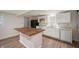 Kitchen featuring stainless appliances and island with butcher block countertop at 2009 N New York Ave, Muncie, IN 47304