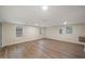 Bright living room offers ample space and natural light with multiple windows at 2009 N New York Ave, Muncie, IN 47304