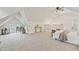 Bright bedroom featuring neutral walls, a ceiling fan, and minimalist decor at 2026 E 10Th St, Indianapolis, IN 46201