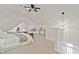 Bright bedroom featuring neutral walls, a ceiling fan, and minimalist decor at 2026 E 10Th St, Indianapolis, IN 46201