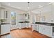 An updated kitchen with stainless steel appliances, granite countertop, and bright natural lighting at 2026 E 10Th St, Indianapolis, IN 46201