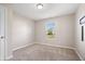 Neutral bedroom with carpet and a window provides a blank canvas for personalization at 216 Haywood Rd, Greenwood, IN 46142