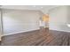 Spacious living area with neutral paint, luxury vinyl plank flooring and an open floor plan at 216 Haywood Rd, Greenwood, IN 46142