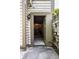 A side view showing walkout access to the basement with an open door at 2247 Frisco Pl, Indianapolis, IN 46240