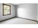 Empty bedroom with neutral carpet, a window, and painted walls at 2247 Frisco Pl, Indianapolis, IN 46240
